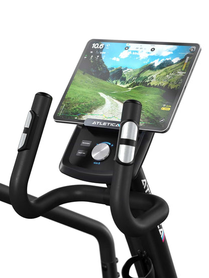 Vélo elliptique Crossfold avec écran, paysage montagneux et poignées pour entraînement interactif